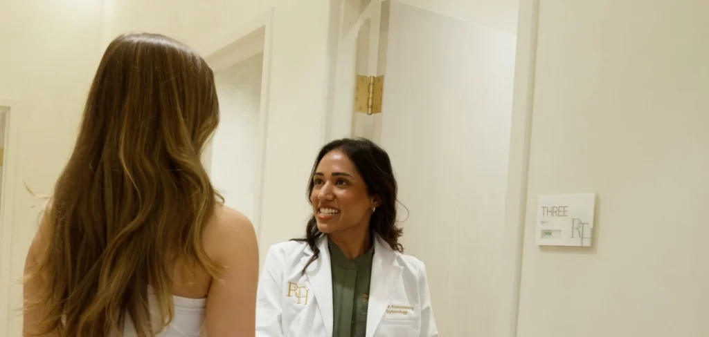 Female provider greeting a patient at Renova Total Health in Carmel, Indiana