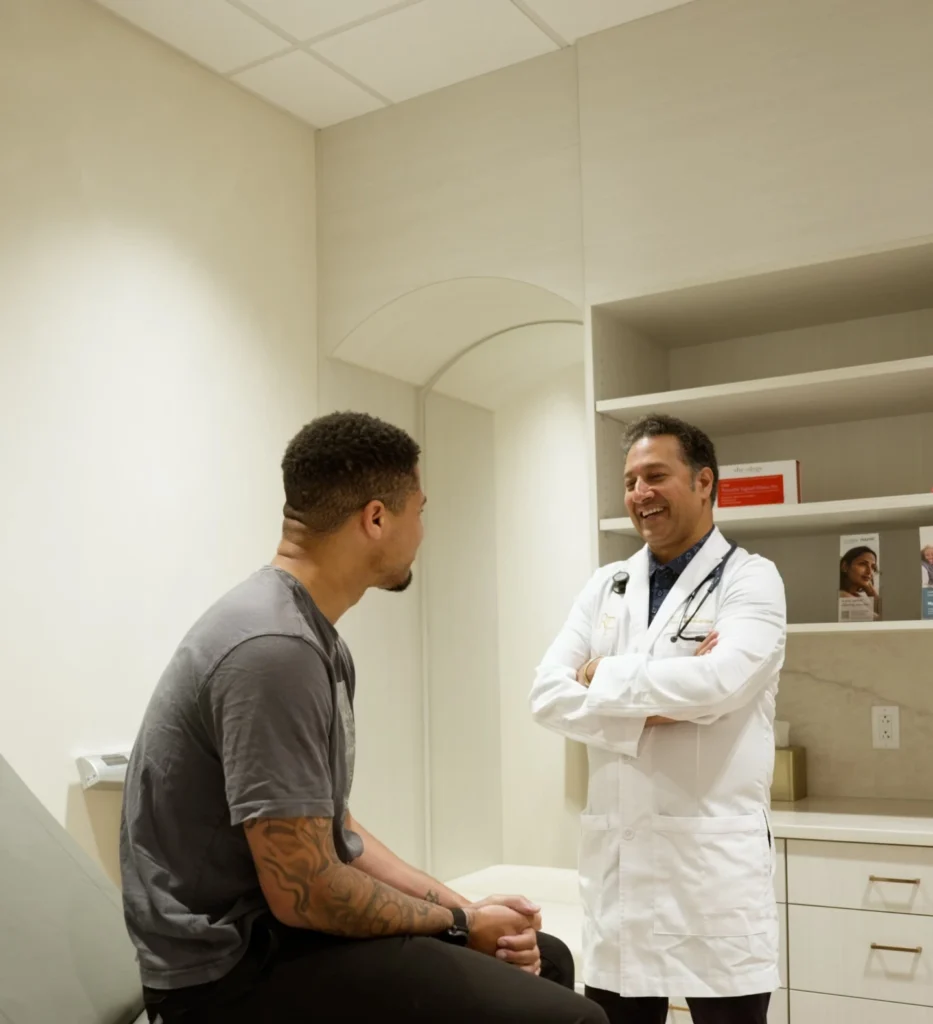 Physician and patient during a membership care visit at Renova Total Health